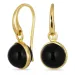 rond zwarte onyx oorbellen in verguld messing - Loom Stones