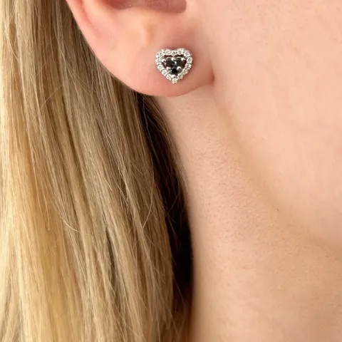 hart zwart diamant oorsteker in 14 karaat witgoud met zwart diamant en diamant