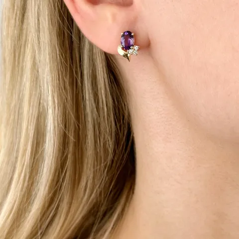 bloem amethist diamant oorbellen in 14 karaat goud met diamant en amethist