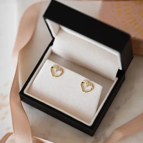 Hart diamant oorsteker in 14 karaat goud met diamanten 