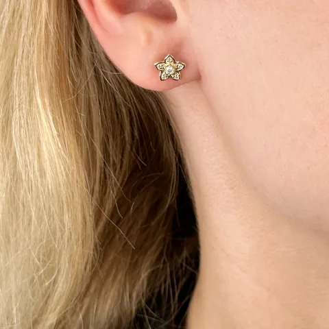 bloem diamant oorsteker in 14 karaat goud met diamant
