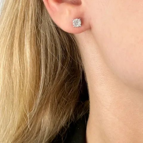 rond diamant oorbellen in 14 karaat witgoud met diamant en diamant
