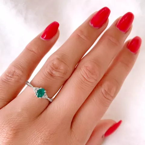 ovale smaragd diamant ring in 14 karaat witgoud 0,47 ct 0,10 ct