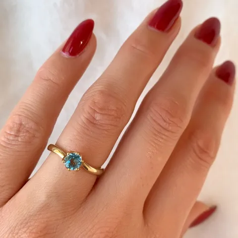 topaas solitaire ring in 9 karaat goud 0,65 ct