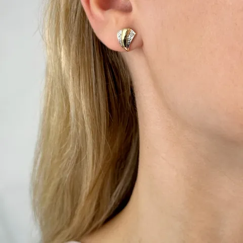 briljant oorbellen in 14 karaat goud en witgoud met diamant 