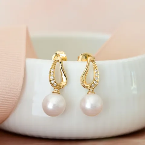 lange parel briljant oorbellen in 14 karaat goud met diamant