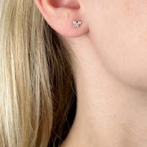 vlinder diamant oorsteker in 14 karaat goud met diamant