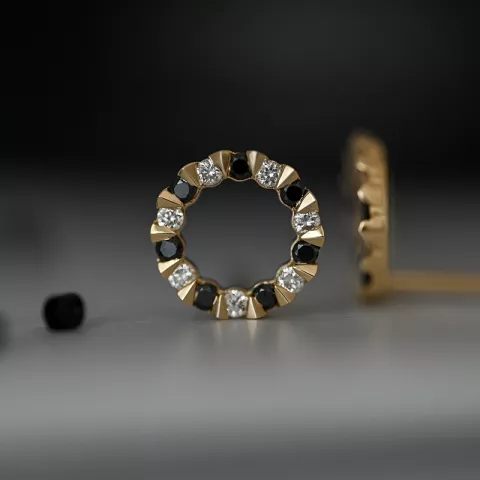 rond zwart diamant oorsteker in 14 karaat goud met diamant en zwart diamant 