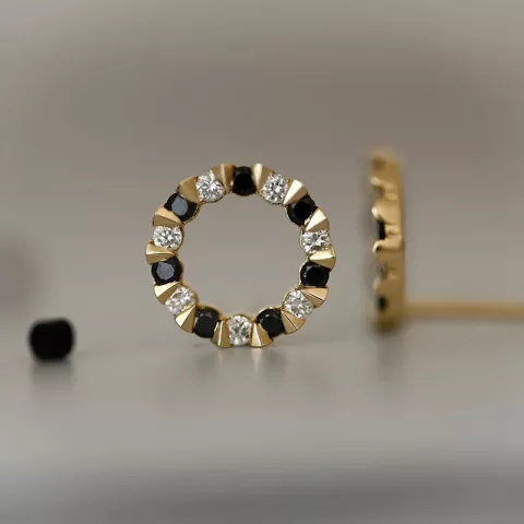 rond zwart diamant oorsteker in 14 karaat goud met diamant en zwart diamant 