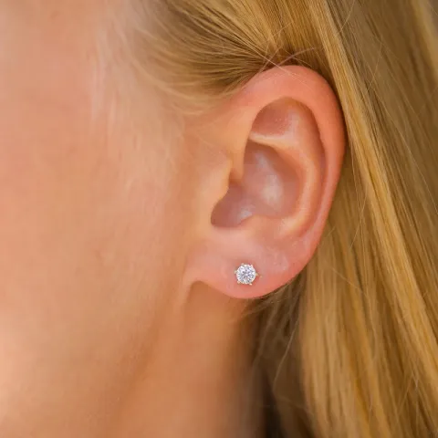4 mm solitaire oorbel in 9 karaat goud met zirkonen