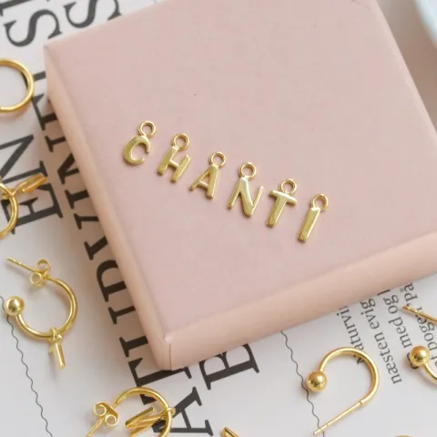 letter n halfcreool in verguld zilver