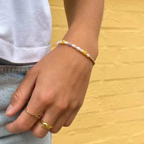 Hultquist bloem armband in verguld sterlingzilver geel steen paarse steen