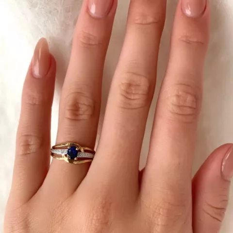 blauwe gouden ring in 9 karaat goud met rodium