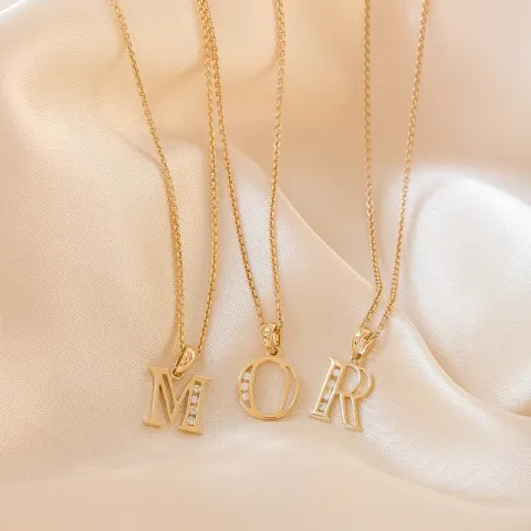 letter r hanger in 14 caraat goud 0,04 ct