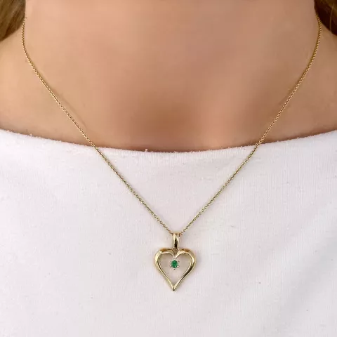 hart smaragd hanger in 14 caraat goud 0,07 ct