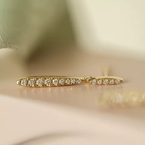 lange diamant oorbellen in 14 karaat goud met diamant 