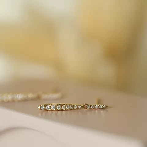 lange diamant oorbellen in 14 karaat goud met diamant 