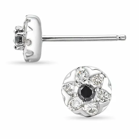 rond diamant oorsteker in 14 karaat witgoud met diamant en zwart diamant