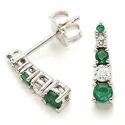 Bestelde artikel - groene smaragd oorsteker in 14 karaat witgoud met diamanten en smaragden