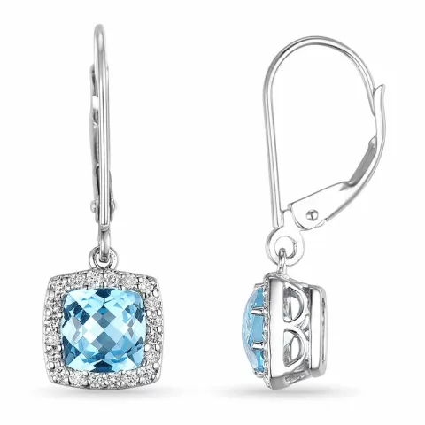 lange blauwe topaas oorbellen in 14 karaat witgoud met diamant en topaas