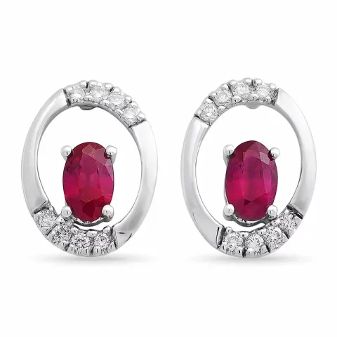 ovaal robijn oorsteker in 14 karaat witgoud met diamant en robijn