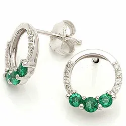 rond smaragd oorsteker in 14 karaat witgoud met diamant en smaragd