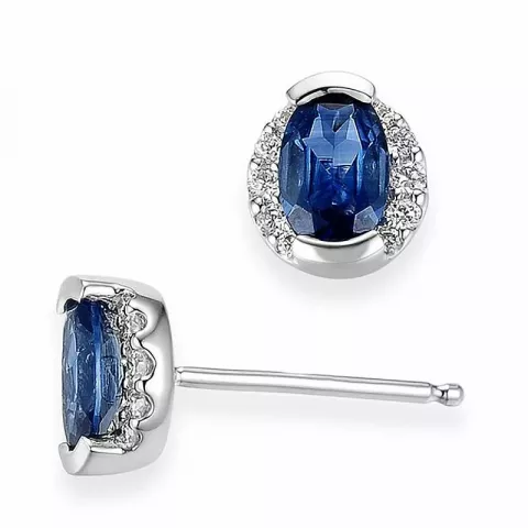 ovaal blauwe saffier oorsteker in 14 karaat witgoud met diamant en saffier 
