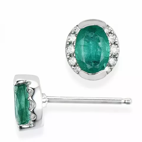 ovaal smaragd oorsteker in 14 karaat witgoud met diamant en smaragd 