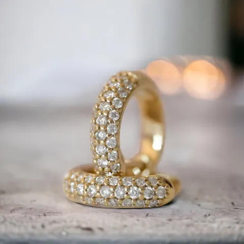 diamant creool in 14 karaat goud met diamant