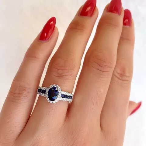 ovale blauwe saffier diamant ring in 14 karaat witgoud 0,286 ct 