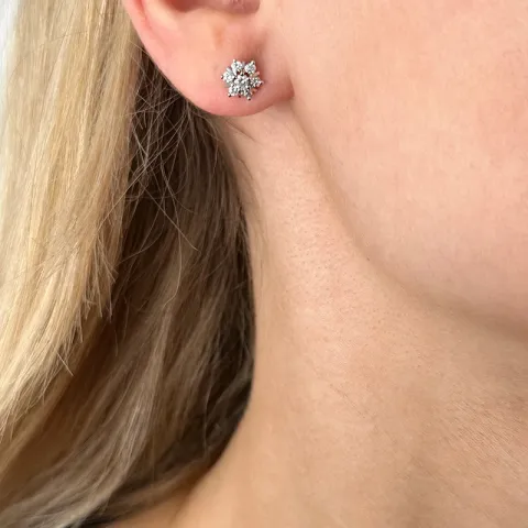 ster diamant oorsteker in 14 karaat witgoud met diamant