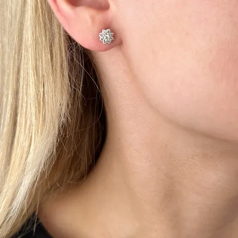 bloem diamant oorbellen in 14 karaat goud met diamant