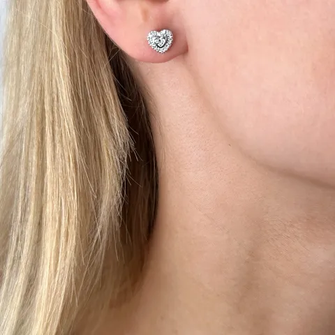 hart diamant oorsteker in 14 karaat witgoud met diamant