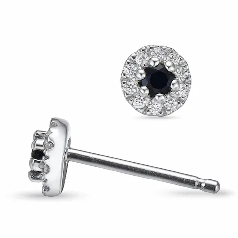 rond blauwe saffier oorsteker in 14 karaat witgoud met diamant en saffier