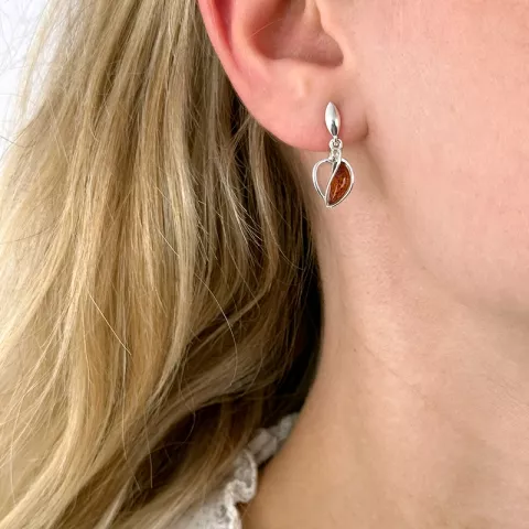 Hart abstract oorsteker in zilver