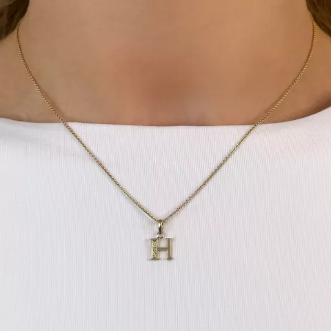 Letter h diamant hanger in 9 caraat goud 0,02 ct