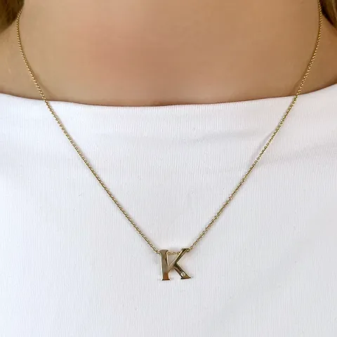 Letter k diamant hanger in 9 caraat goud 0,01 ct