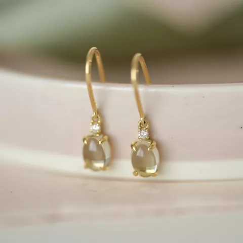 ovaal groene amethist diamant oorbellen in 9 karaat goud met diamant en amethist 