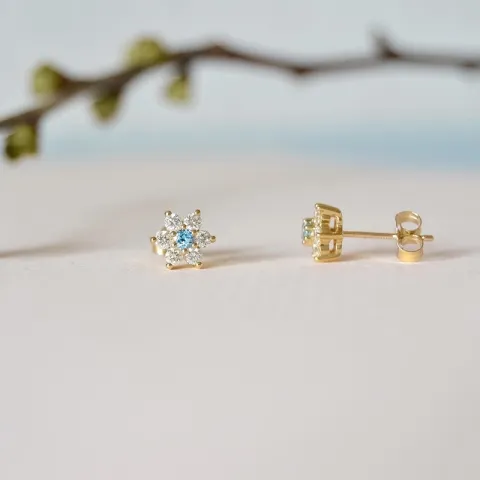 bloem topaas diamant oorbellen in 9 karaat goud met diamant en topaas