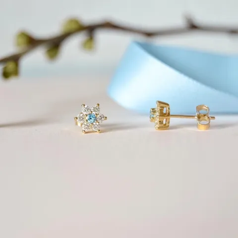 bloem topaas diamant oorbellen in 9 karaat goud met diamant en topaas