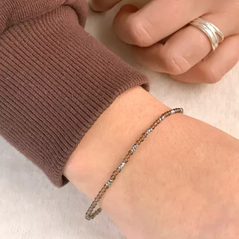 Elegant steen armband met kwarts en hematite.