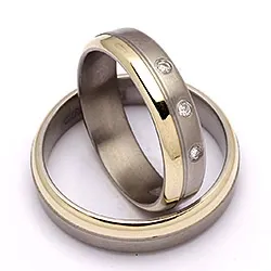 Trouwringen in titanium en goud 0,06 ct