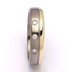 Trouwring in titanium en goud 0,06 ct