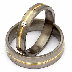 Trouwringen in titanium en goud 0,04 ct