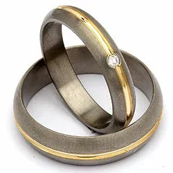 Trouwringen in titanium en goud 0,03 ct