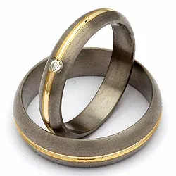 Trouwringen in titanium en goud 0,03 ct