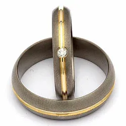 Trouwringen in titanium en goud 0,03 ct