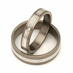 Trouwringen in 14 karaat titanium en goud 0,025 ct