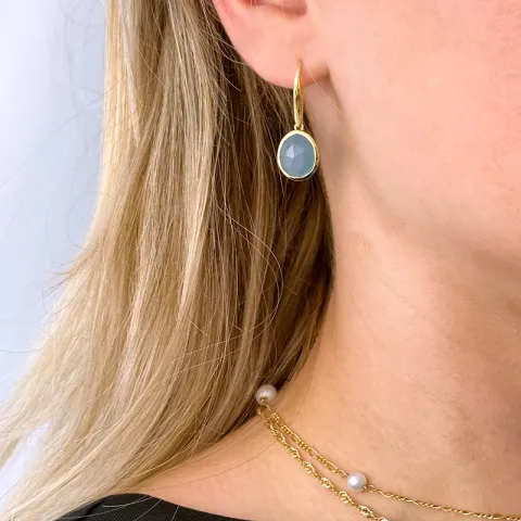 blauwe calcedon oorbellen in verguld zilver