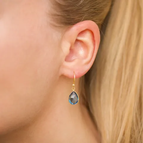 druppel donkerblauw kristal oorbellen in verguld sterlingzilver
